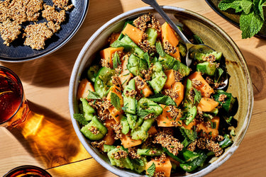 Smashed Cucumber & Melon Salad with Spicy Sesame Crunch