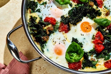 Skillet Polenta with Sausage, Kale, Roasted Tomatoes & Eggs