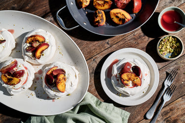 Pavlovas with Grilled Stone Fruit and Blood Orange & Cardamom Syrup